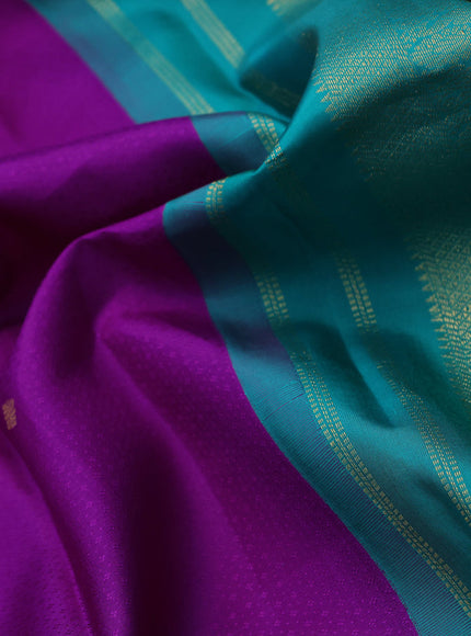 Pure kanchipuram silk saree purple and teal green with allover self emboss & buttas and zari woven korvai border