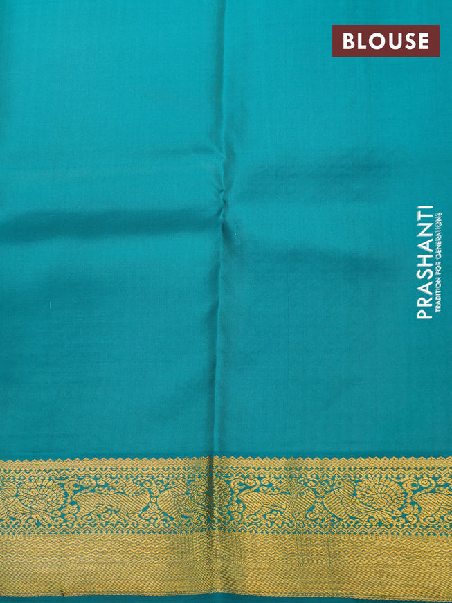 Pure kanchipuram silk saree purple and teal green with allover self emboss & buttas and zari woven korvai border