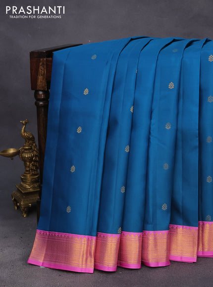 Pure kanchipuram silk saree peacock blue and light pink with zari woven buttas and zari woven korvai border