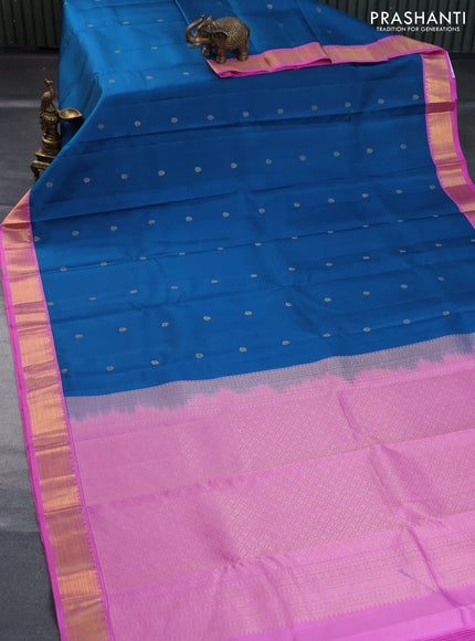 Pure kanchipuram silk saree peacock blue and light pink with zari woven buttas and zari woven korvai border