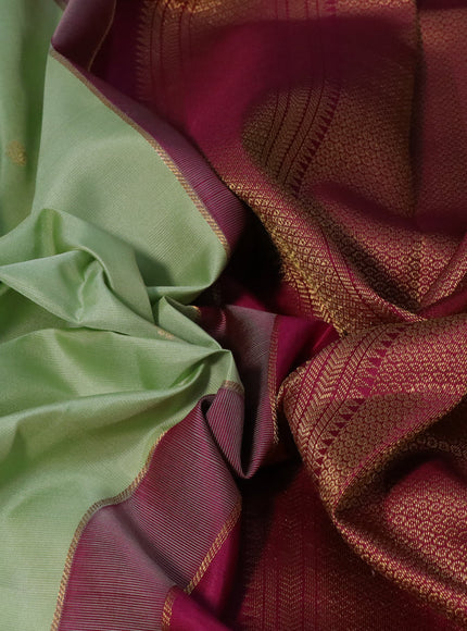 Pure kanchipuram silk saree pista green and magenta pink with zari woven buttas and zari woven korvai border