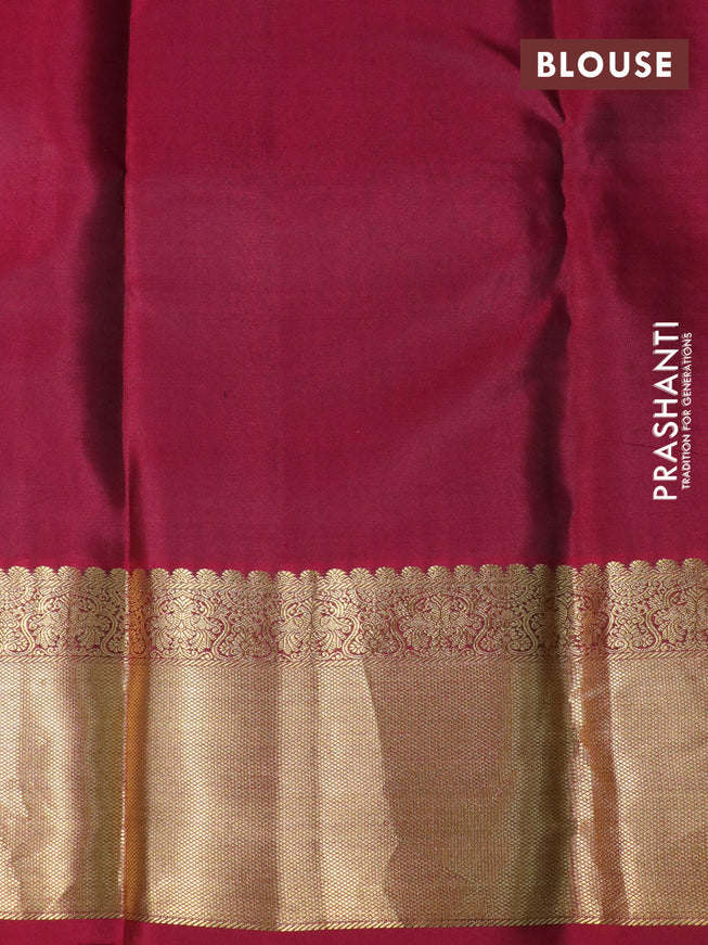 Pure kanchipuram silk saree green and maroon with allover zari weaves & buttas and zari woven border