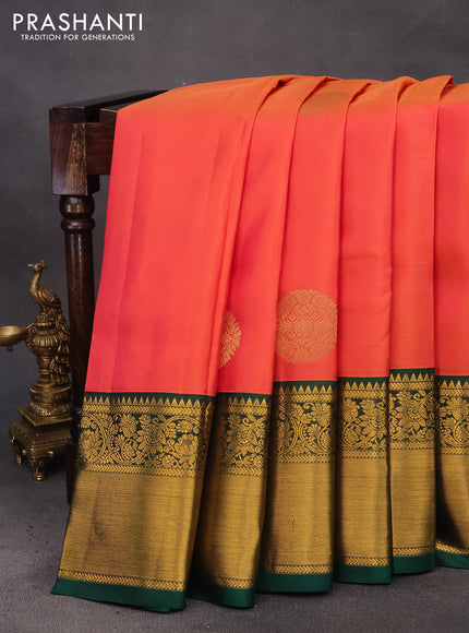 Pure kanchipuram silk saree dual shade of pinkish orange and green with zari woven buttas and long zari woven korvai border