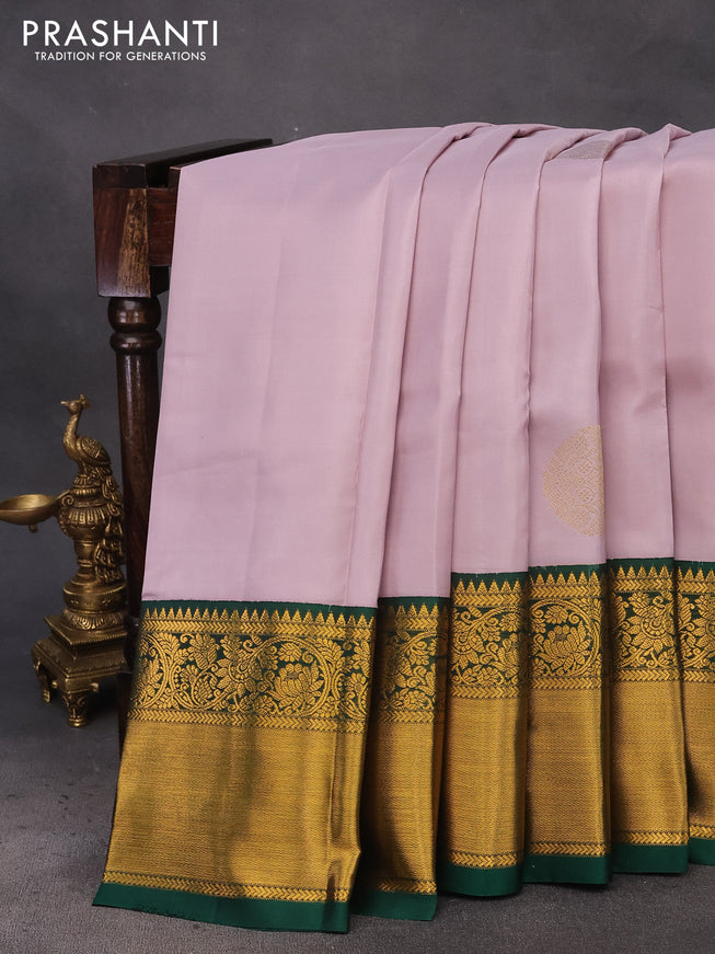 Pure kanchipuram silk saree pastel lavender shade and green with zari woven buttas and long zari woven korvai border