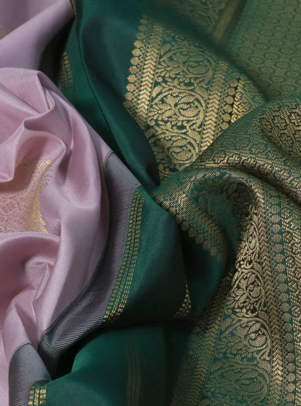 Pure kanchipuram silk saree pastel lavender shade and green with zari woven buttas and long zari woven korvai border