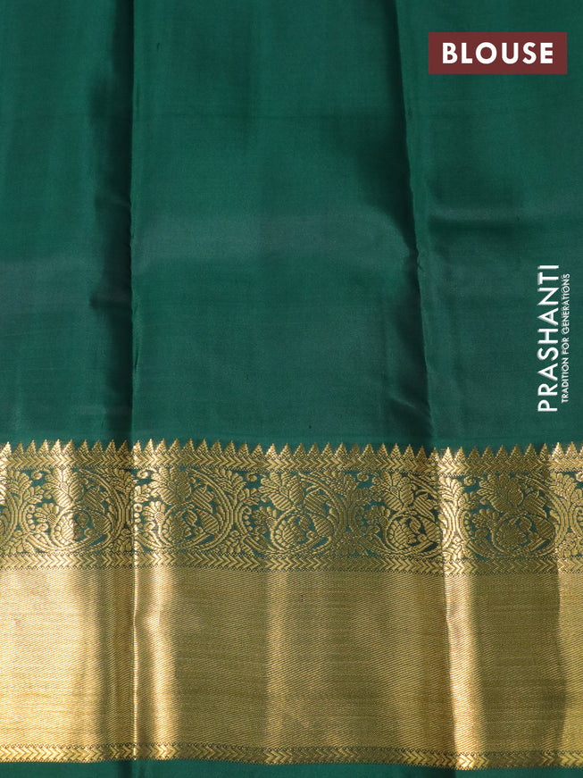 Pure kanchipuram silk saree pastel lavender shade and green with zari woven buttas and long zari woven korvai border