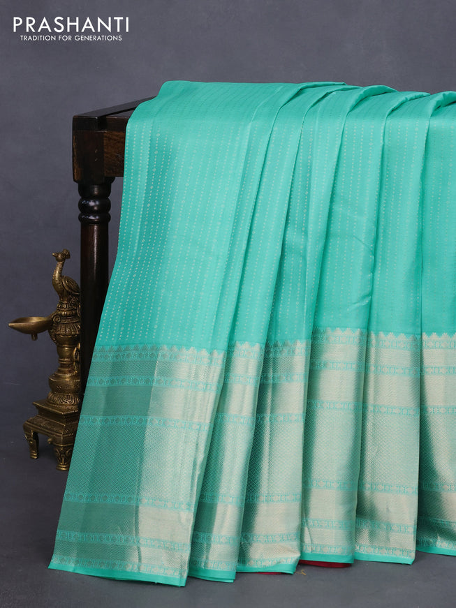 Pure kanchipuram silk saree teal blue and magenta pink with allover zari weaves and long zari woven border