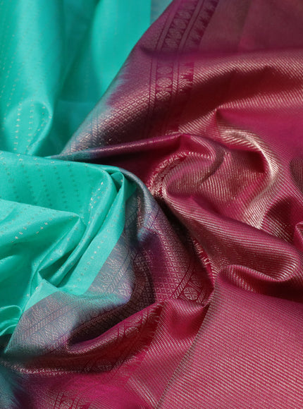 Pure kanchipuram silk saree teal blue and magenta pink with allover zari weaves and long zari woven border