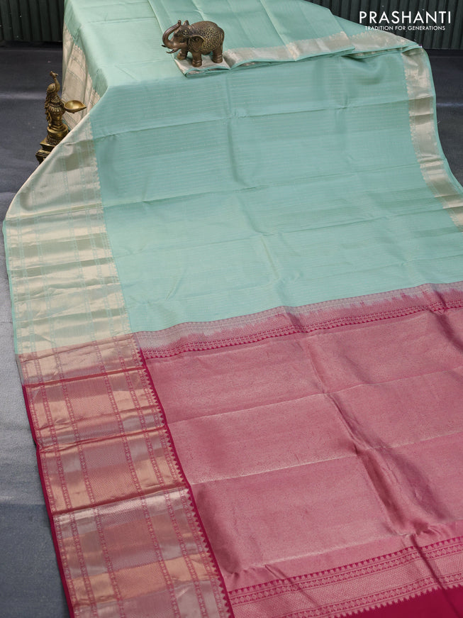 Pure kanchipuram silk saree pastel green and magenta pink with allover zari weaves and long zari woven border