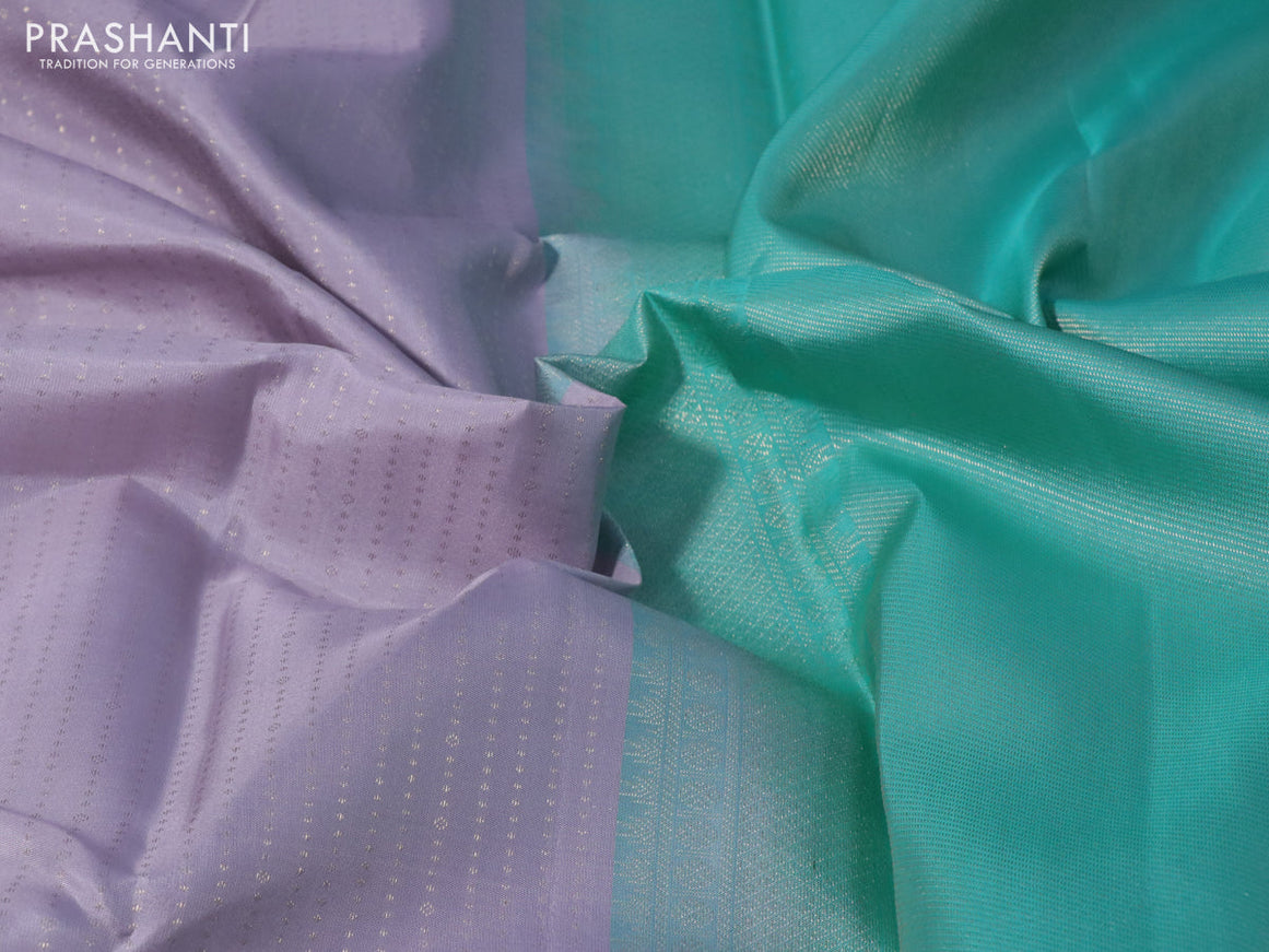 Pure kanchipuram silk saree pastel lavender shade and teal green with allover zari weaves and long zari woven border