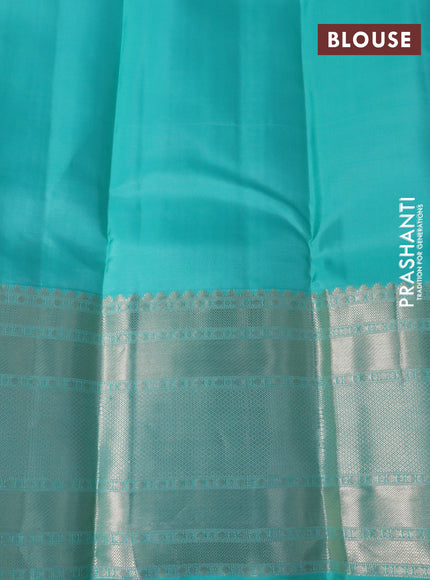 Pure kanchipuram silk saree pastel lavender shade and teal green with allover zari weaves and long zari woven border