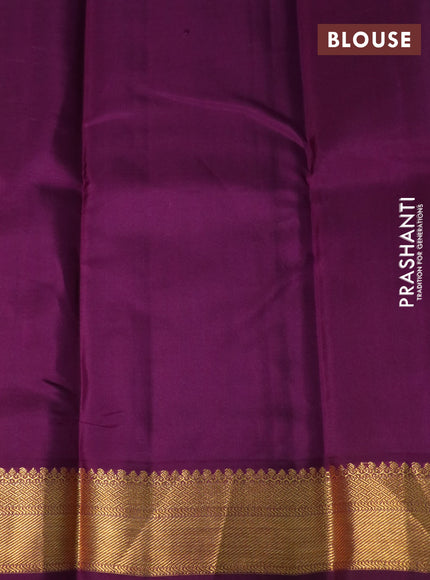 Pure kanchipuram silk saree off white and deep purple with zari woven buttas and zari woven korvai border