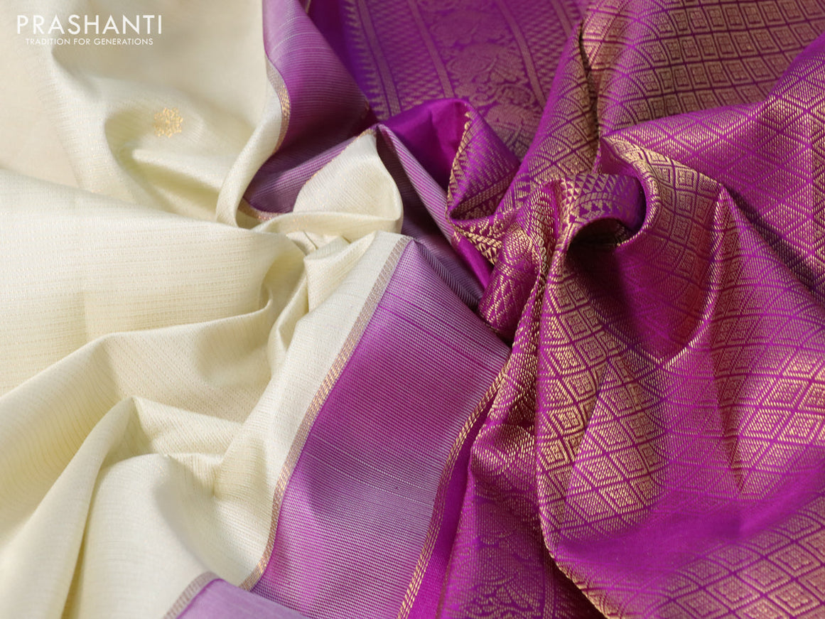 Pure kanchipuram silk saree cream and purple with allover zari weaves & buttas and zari woven korvai border