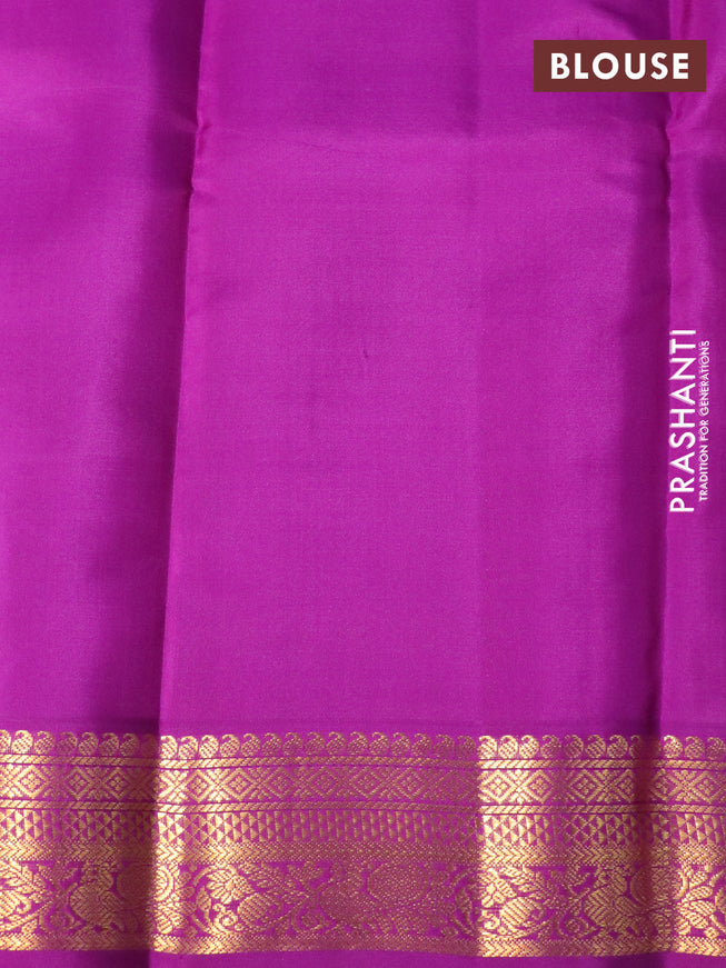 Pure kanchipuram silk saree cream and purple with allover zari weaves & buttas and zari woven korvai border