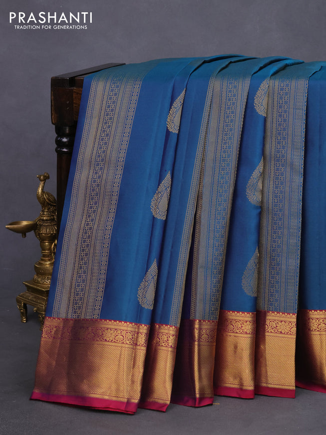 Pure kanchipuram silk saree peacock blue and magenta pink with allover zari weaves and zari woven border