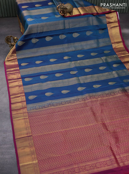 Pure kanchipuram silk saree peacock blue and magenta pink with allover zari weaves and zari woven border