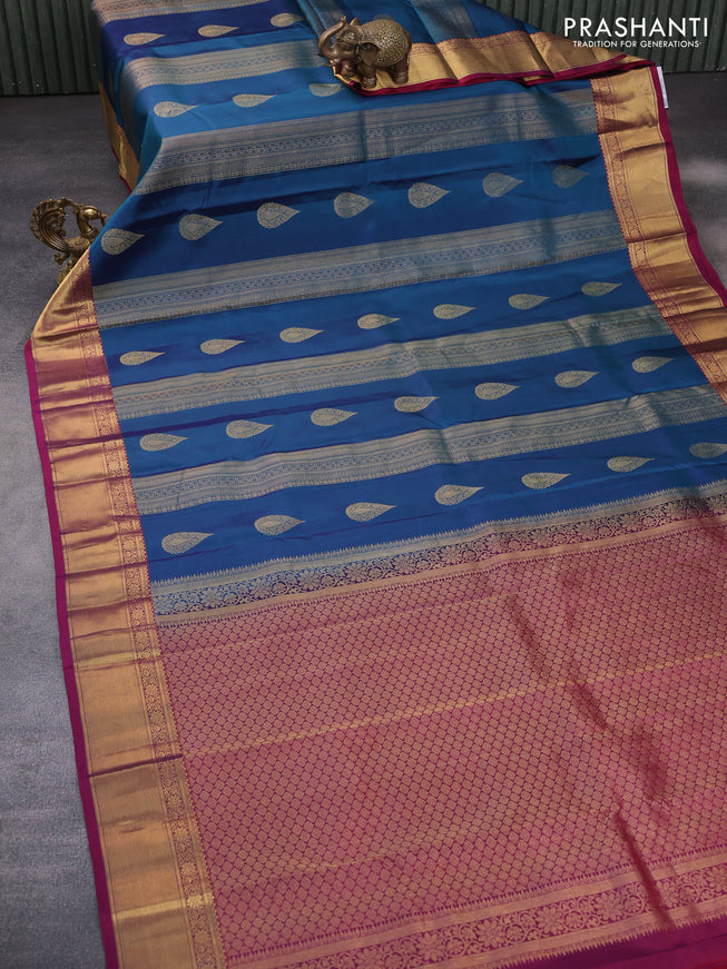 Pure kanchipuram silk saree peacock blue and magenta pink with allover zari weaves and zari woven border