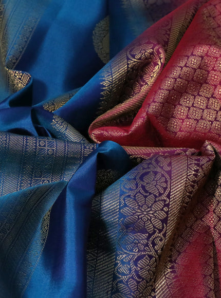 Pure kanchipuram silk saree peacock blue and magenta pink with allover zari weaves and zari woven border