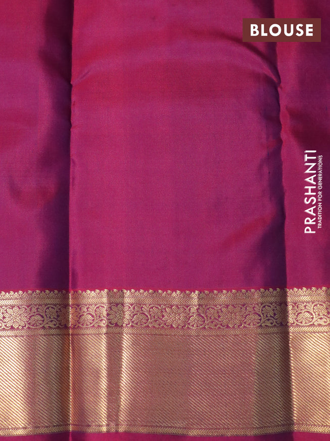 Pure kanchipuram silk saree peacock blue and magenta pink with allover zari weaves and zari woven border