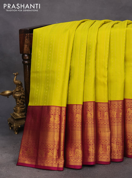 Pure kanchipuram silk saree lime yellow and magenta pink with allover zari weaves and long zari woven korvai border