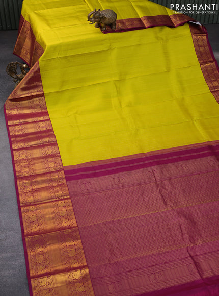 Pure kanchipuram silk saree lime yellow and magenta pink with allover zari weaves and long zari woven korvai border