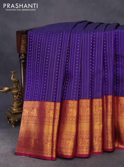 Pure kanchipuram silk saree blue and magenta pink with allover zari weaves and long zari woven korvai border