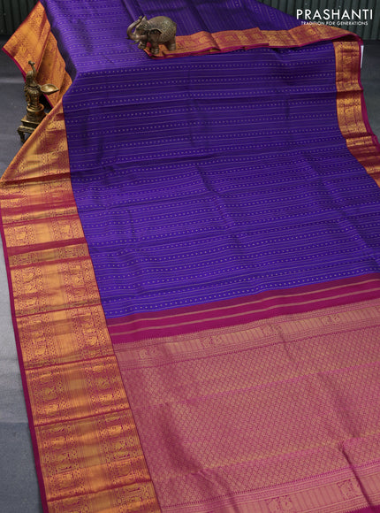 Pure kanchipuram silk saree blue and magenta pink with allover zari weaves and long zari woven korvai border