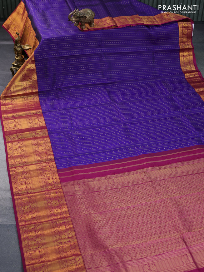 Pure kanchipuram silk saree blue and magenta pink with allover zari weaves and long zari woven korvai border