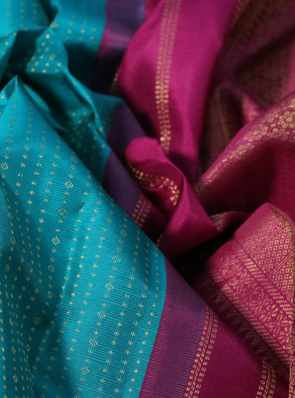 Pure kanchipuram silk saree teal green and magenta pink with allover zari weaves and long zari woven korvai border