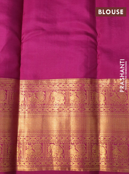 Pure kanchipuram silk saree teal green and magenta pink with allover zari weaves and long zari woven korvai border