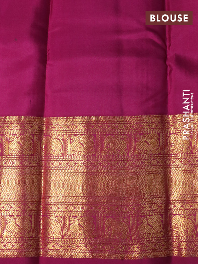 Pure kanchipuram silk saree deep navy blue and magenta pink with allover zari weaves and long zari woven korvai border