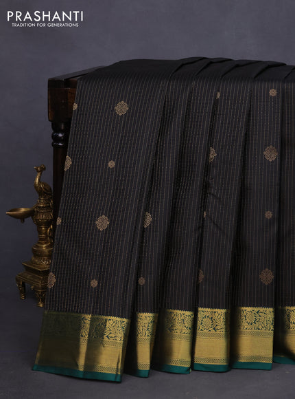 Pure kanchipuram silk saree black and dark green with allover zari strips & buttas and zari woven border