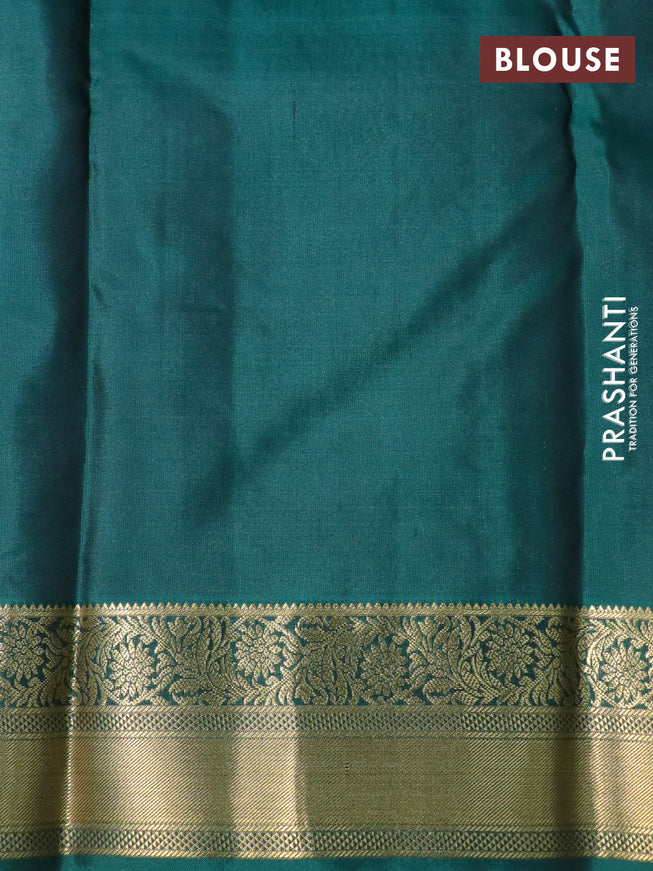 Pure kanchipuram silk saree black and dark green with allover zari strips & buttas and zari woven border