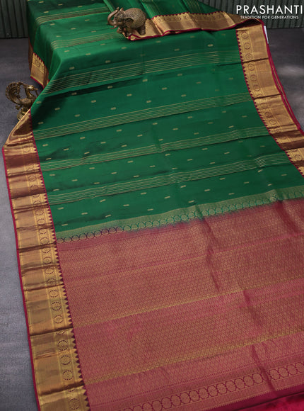 Pure kanchipuram silk saree green and magenta pink with allover zari weaves and zari woven border