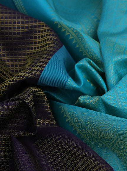 Pure kanchipuram silk saree deep jamun shade and teal blue with allover zari checked pattern and long zari woven korvai border