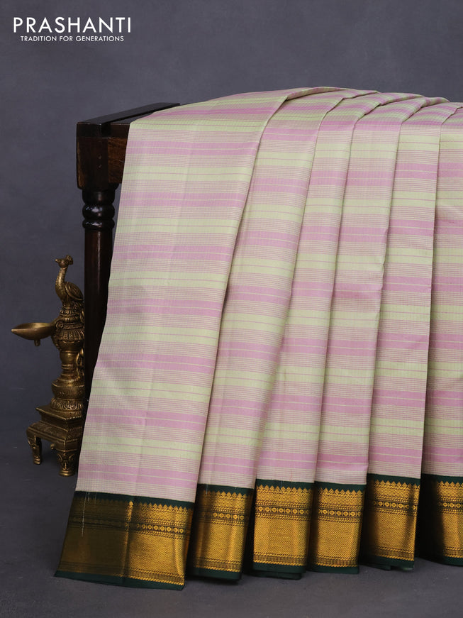 Pure kanchipuram silk saree pastel gree mauve pink and bottle green with allover zari stripe pattern and zari woven korvai border