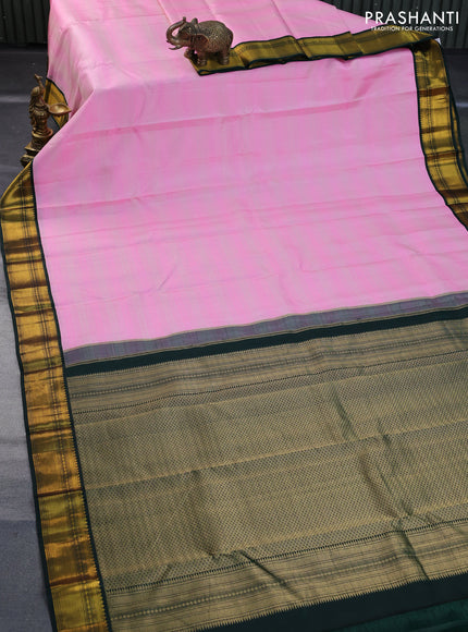 Pure kanchipuram silk saree candy pink and bottle green with allover zari stripe pattern and zari woven korvai border