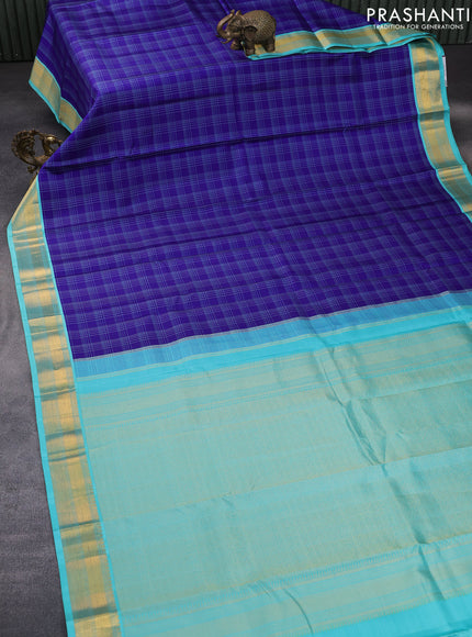 Pure kanchipuram silk saree blue and teal blue with allover checked pattern and zari woven korvai border