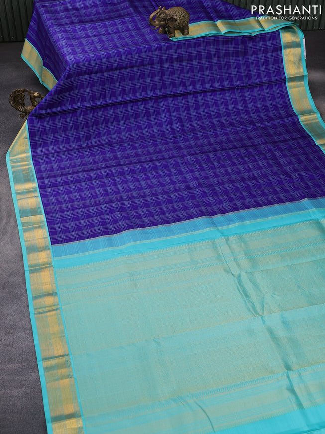 Pure kanchipuram silk saree blue and teal blue with allover checked pattern and zari woven korvai border