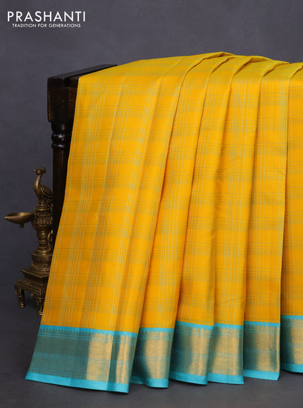 Pure kanchipuram silk saree yellow pastel lavender and teal blue with allover checked pattern and zari woven korvai border