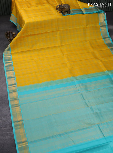 Pure kanchipuram silk saree yellow pastel lavender and teal blue with allover checked pattern and zari woven korvai border