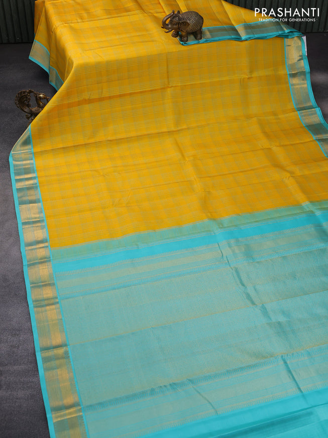 Pure kanchipuram silk saree yellow pastel lavender and teal blue with allover checked pattern and zari woven korvai border