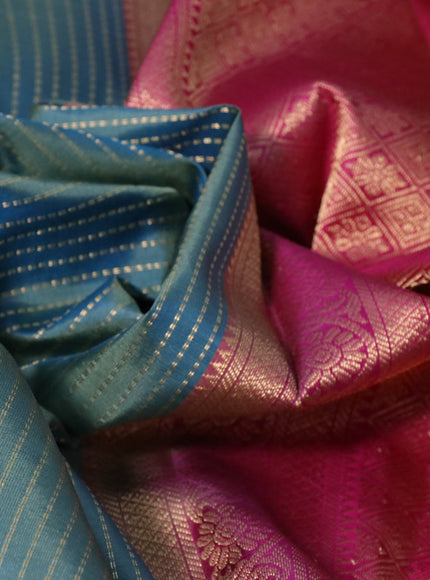 Pure kanchipuram silk saree dual shade of pastel green and pink with allover zari stripe weaves and long zari woven border