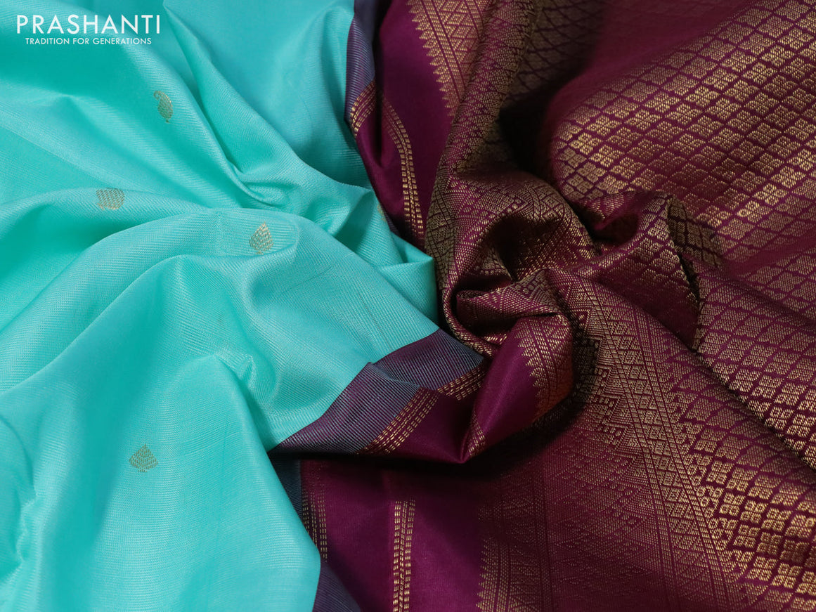 Pure kanchipuram silk saree teal blue and wine shade with zari woven buttas and zari woven korvai border