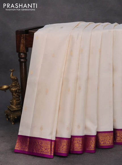 Pure kanchipuram silk saree off white and purple with zari woven buttas and zari woven korvai border