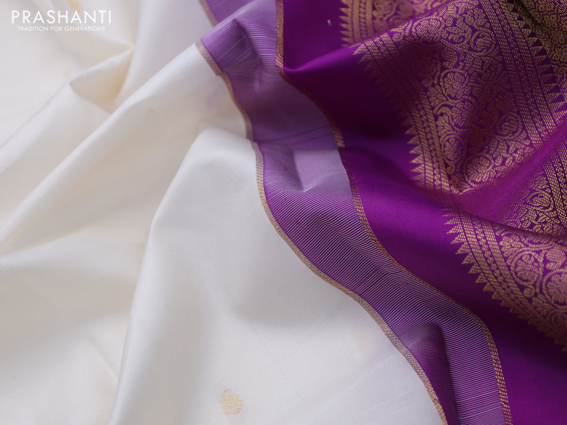 Pure kanchipuram silk saree off white and purple with zari woven buttas and zari woven korvai border