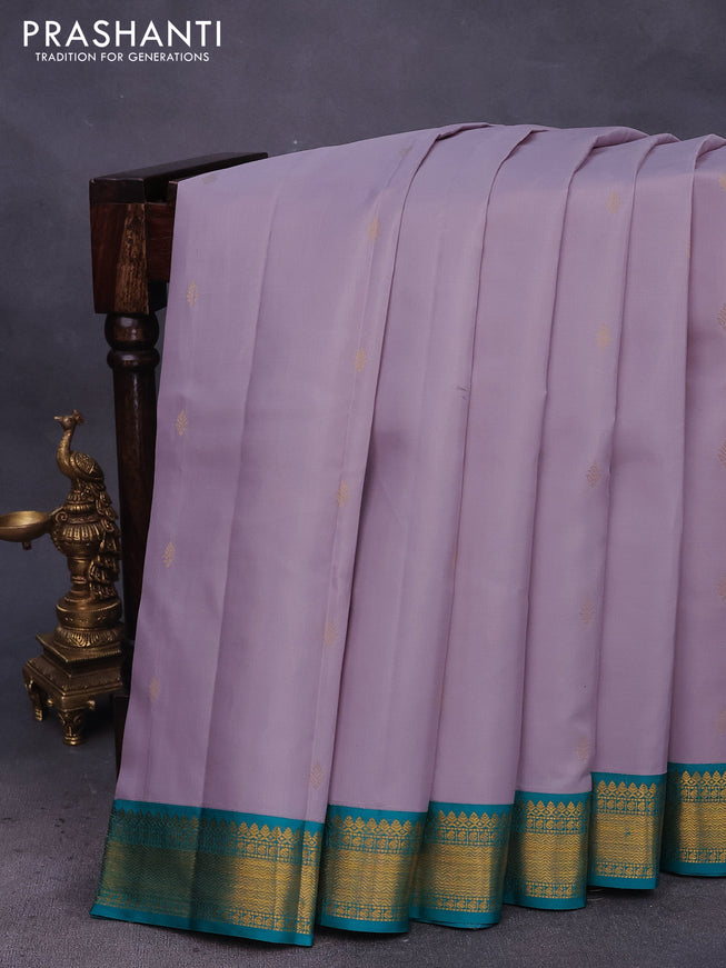 Pure kanchipuram silk saree pastel lavender shade and teal blue with zari woven buttas and zari woven korvai border