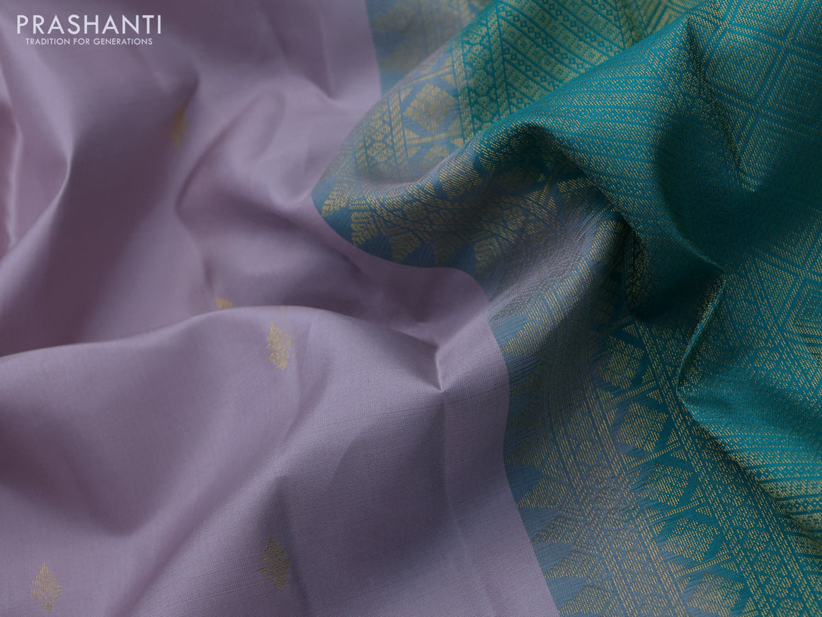 Pure kanchipuram silk saree pastel lavender shade and teal blue with zari woven buttas and zari woven korvai border