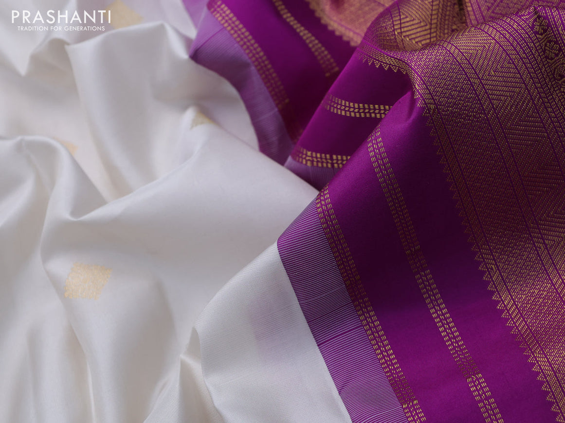 Pure kanchipuram silk saree off white and purple with zari woven buttas and zari woven korvai border