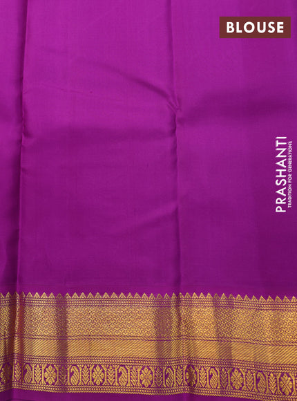 Pure kanchipuram silk saree off white and purple with zari woven buttas and zari woven korvai border